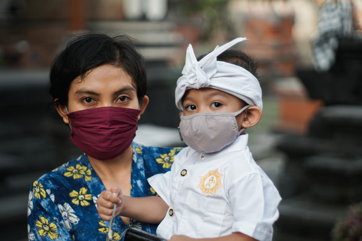  Ilustrasi memakai masker © Pande Putu Hadi Wiguna/Shutterstock 