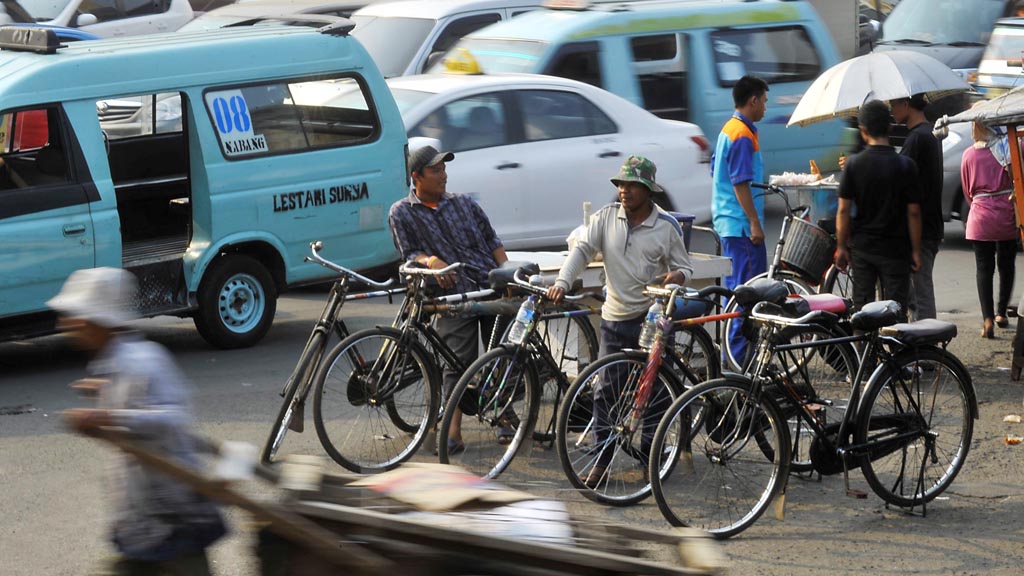 Ojek Sepeda, masih eksis di beberapa kawasan di Jakarta (guguskata.com) 